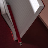 ruled sorrel-red notebook