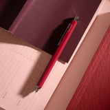 red pen lying flat