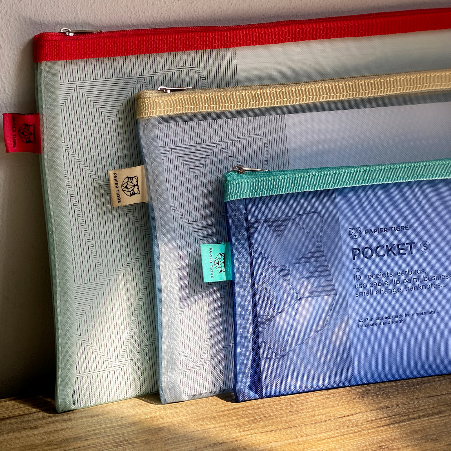 red yellow and aqua mesh pouch